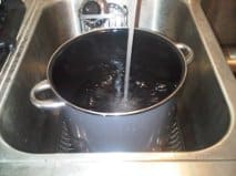 fill 2 pots with water